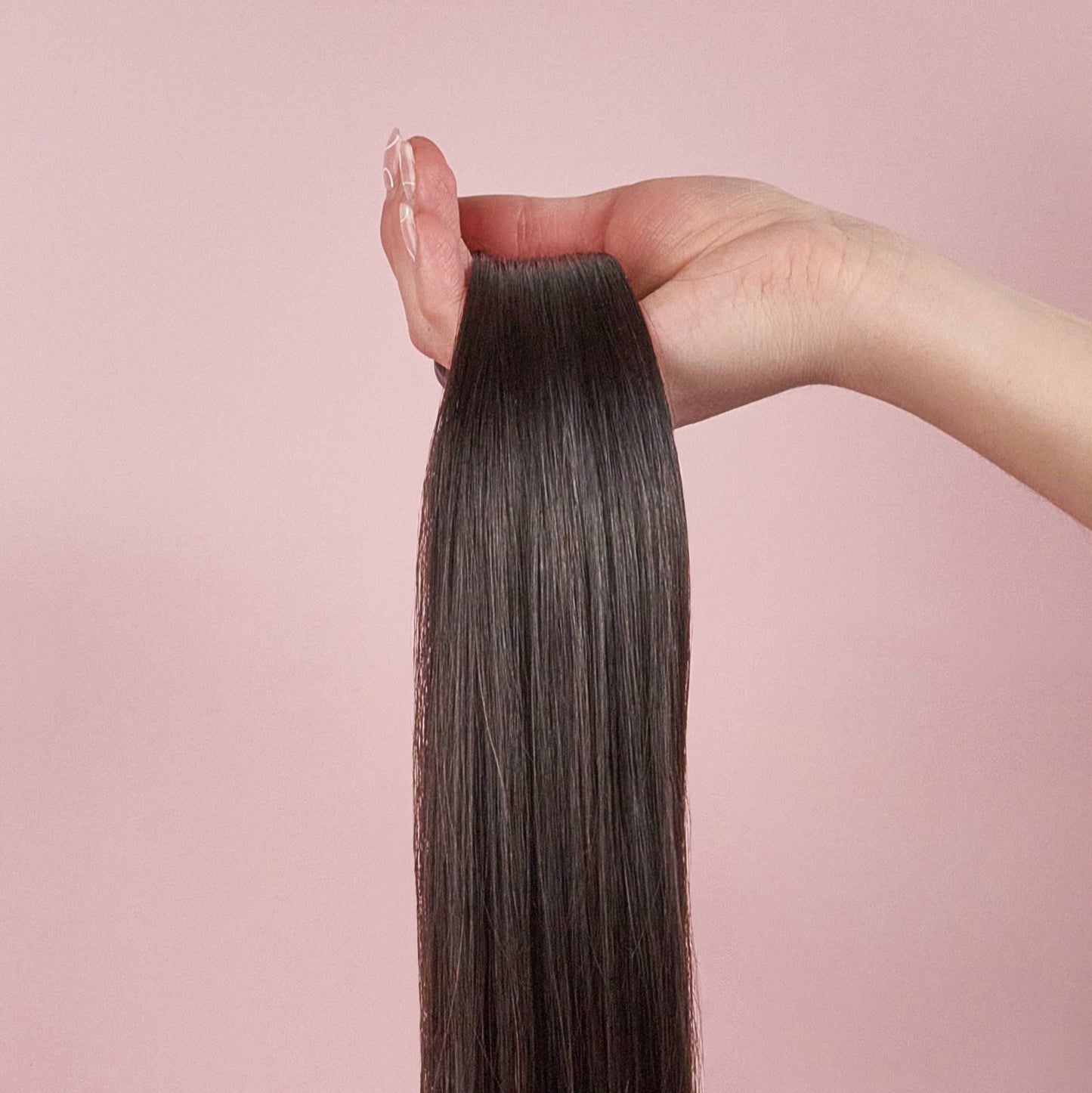 clip in human hair extensions seamless luxe 1b in hand