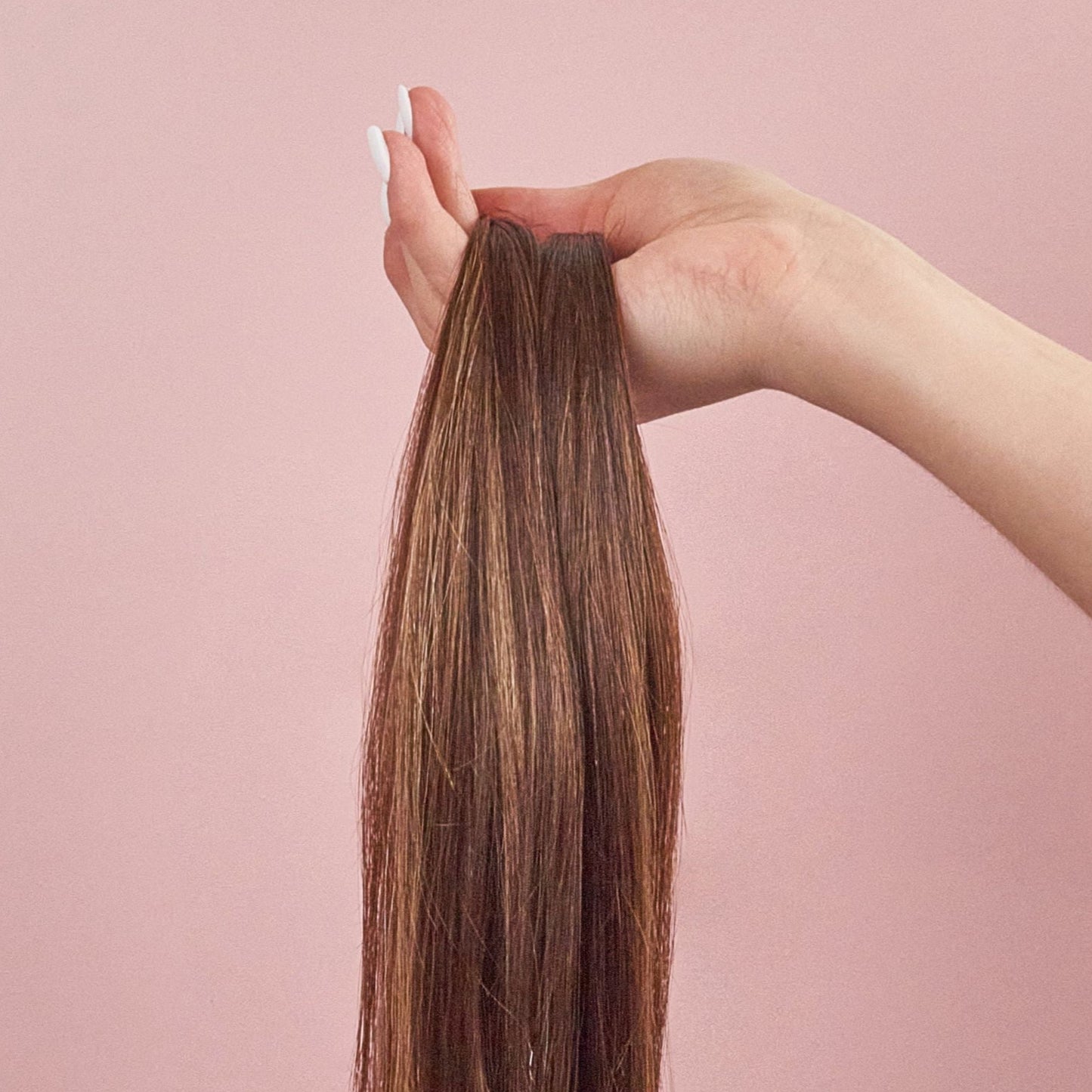 clip in human hair extensions seamless luxe 4+P4/6/16 in hand