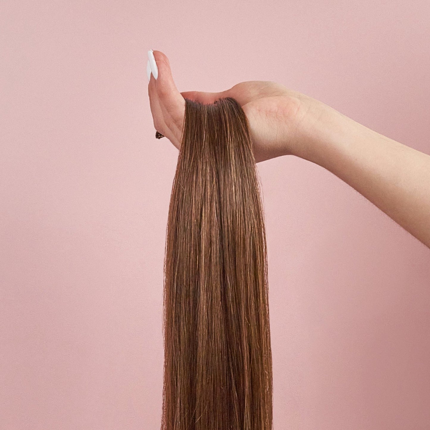 clip in human hair extensions seamless luxe 3 in hand