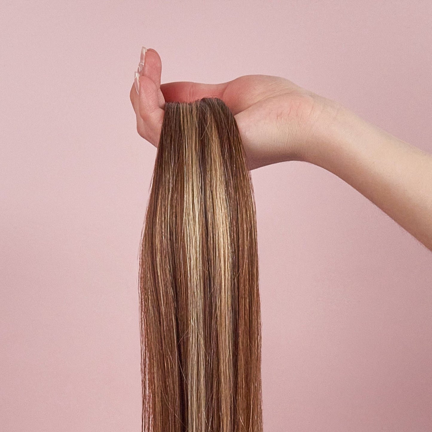 clip in human hair extensions seamless luxe P4/6/16 in hand